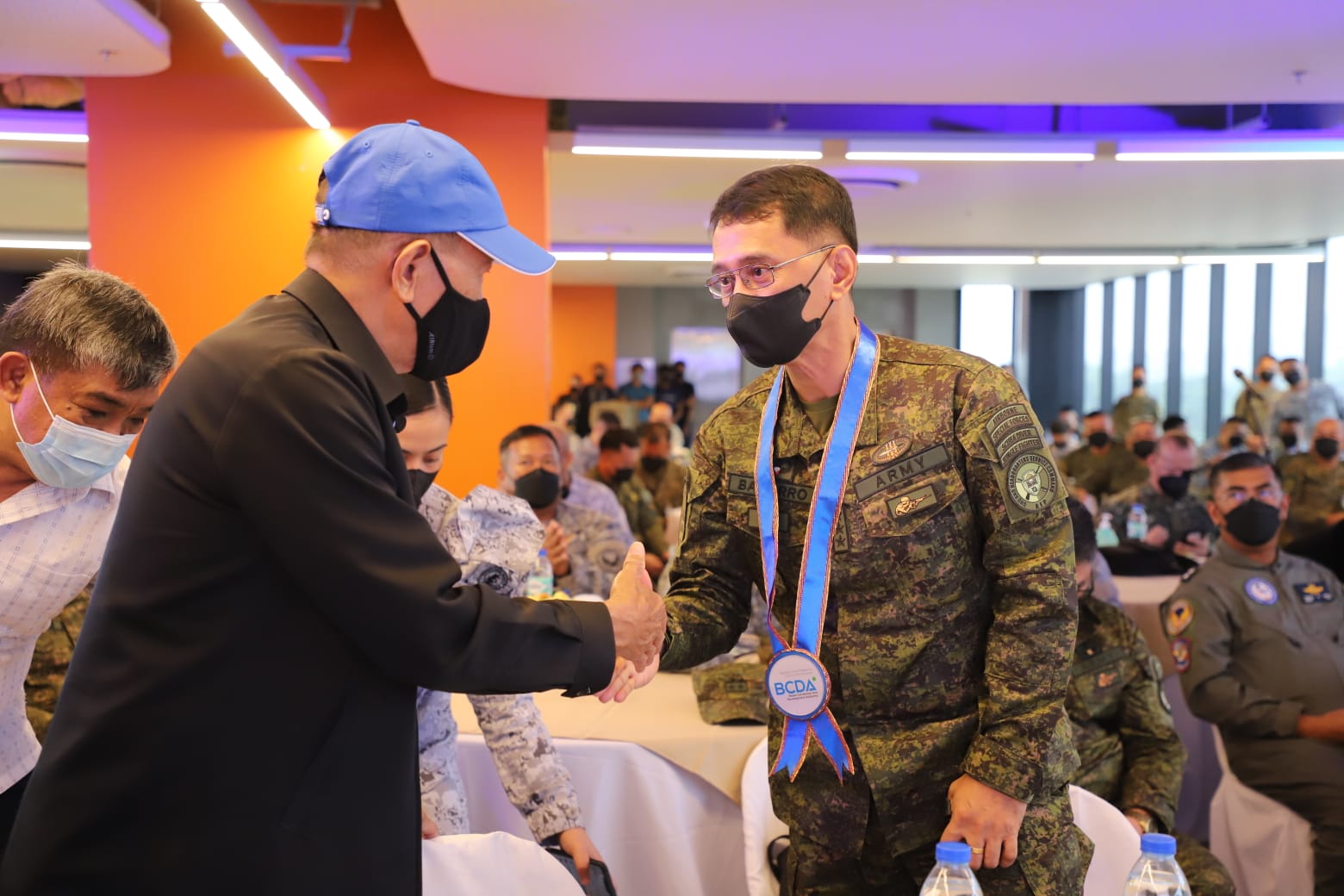 Photo caption: BCDA Chairman Delfin N. Lorenzana welcomes AFP Chief of Staff Lt. Gen. Bartolome Vicente O. Bacarro in New Clark City for the 25th AFP Forum. BCDA photo