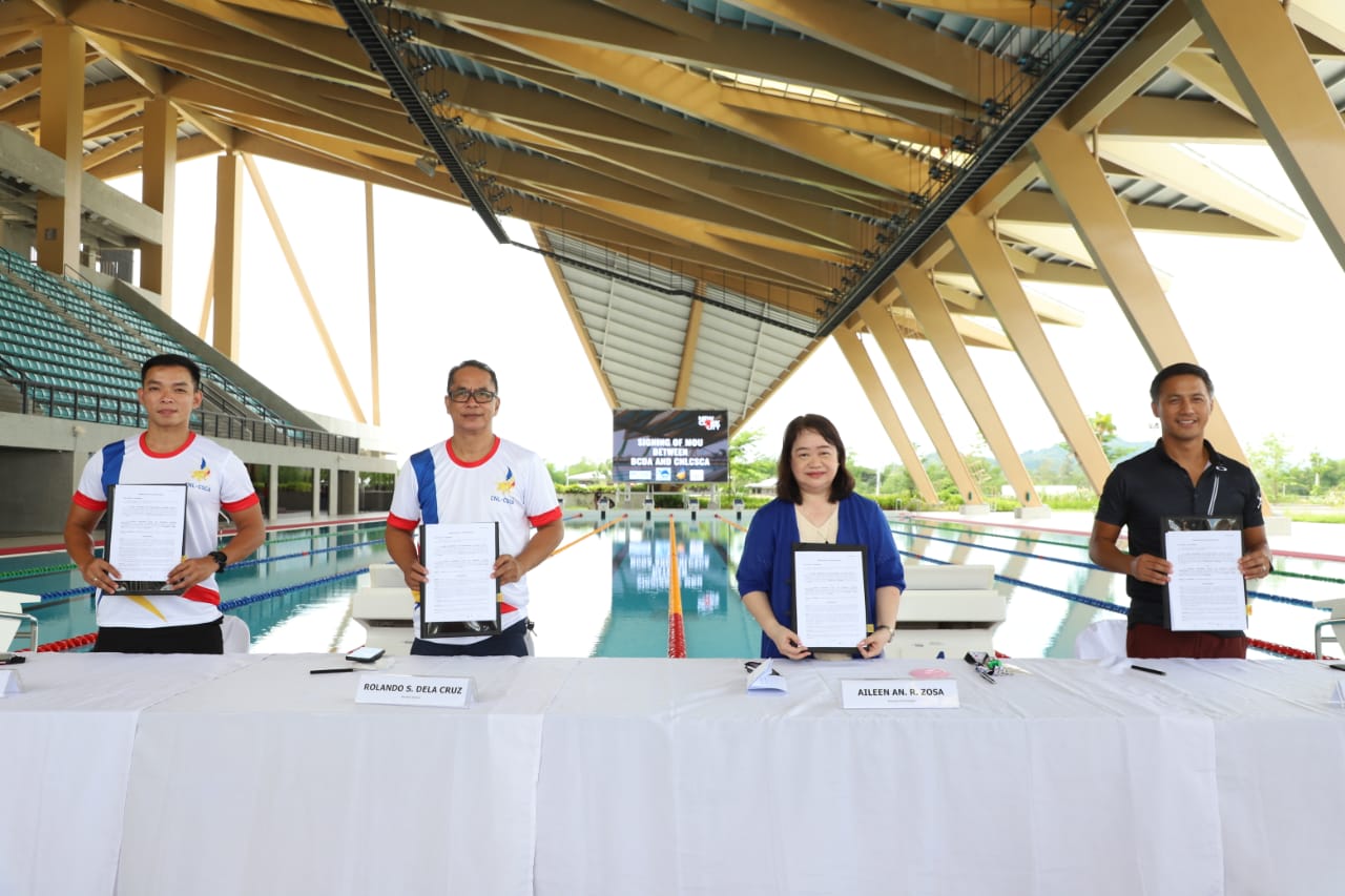Officials holding signed MOU and LA