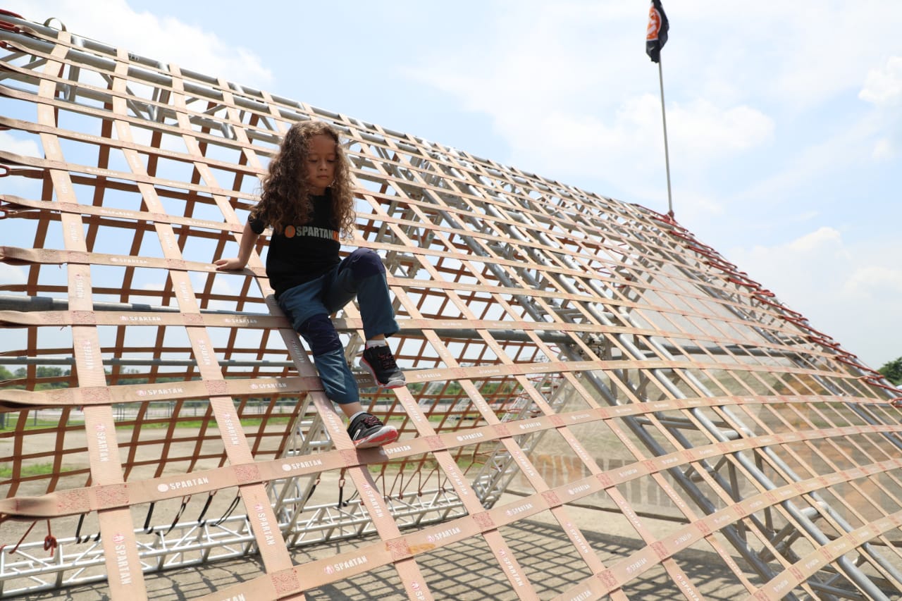 Photo caption: Spartan Race Kids Ambassador Nicolette Celis tries out one of the obstacles at the New Clark City Athletics Stadium.
